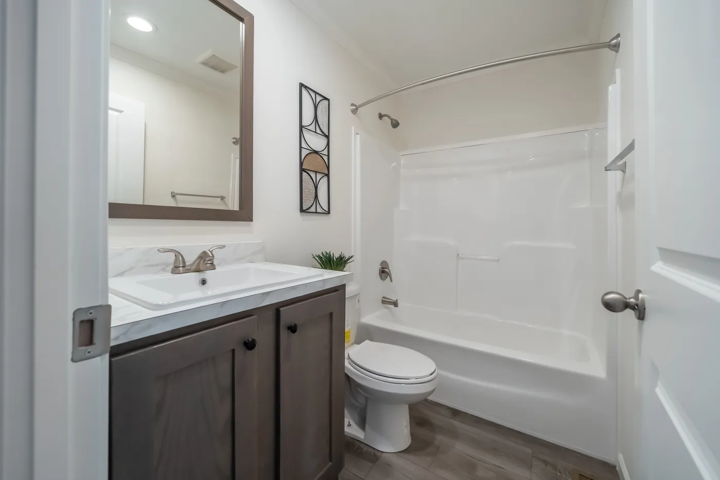 The 4200 "SOUTHPORT" 58'4X16 Guest Bathroom. This Manufactured Mobile Home features 2 bedrooms and 2 baths.