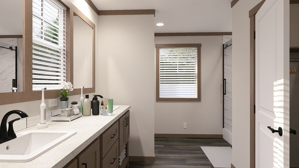 The WILDER Primary Bathroom. This Manufactured Mobile Home features 3 bedrooms and 2 baths.
