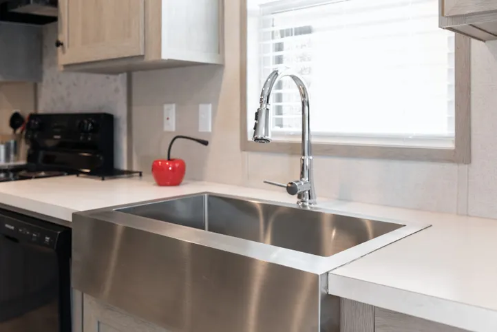 The THE ANNIVERSARY 76 Kitchen. This Manufactured Mobile Home features 3 bedrooms and 2 baths.