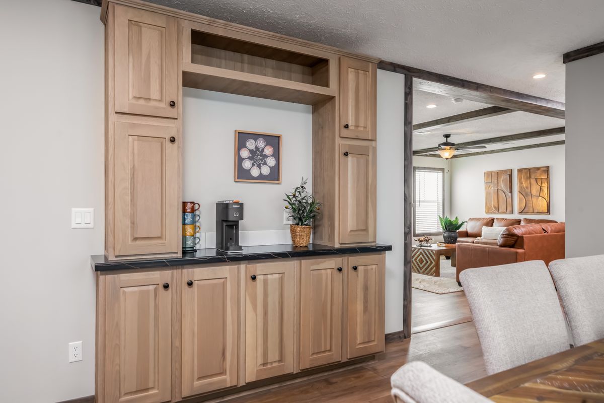 The THE JACKSON Dining Area. This Manufactured Mobile Home features 4 bedrooms and 2 baths.