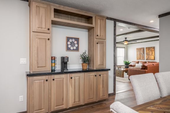 The THE JACKSON Dining Area. This Manufactured Mobile Home features 4 bedrooms and 2 baths.