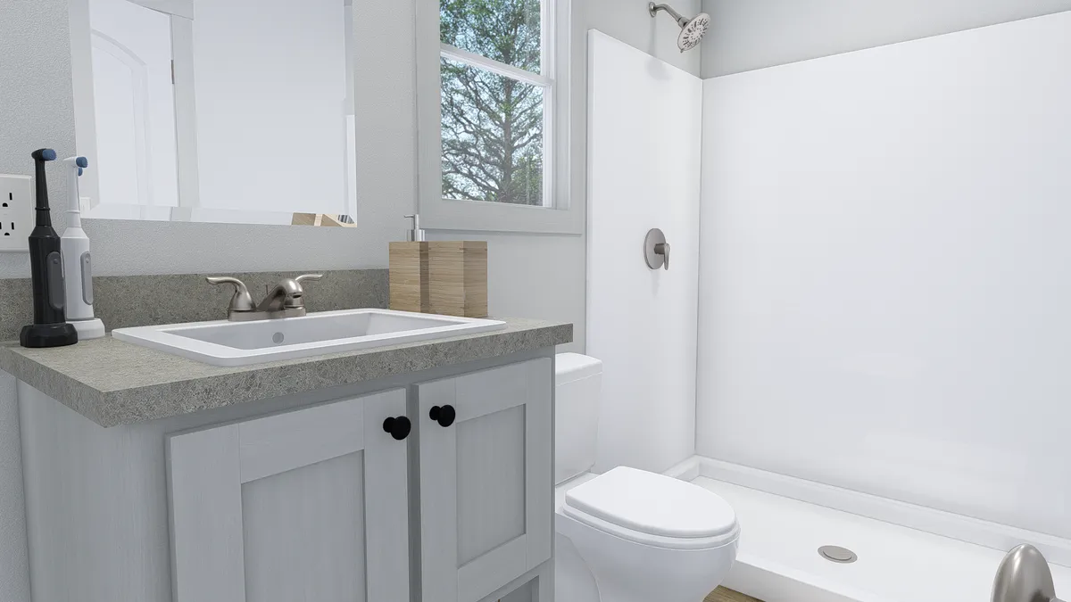 The GOOD VIBRATIONS Master Bathroom. This Manufactured Mobile Home features 3 bedrooms and 2 baths.