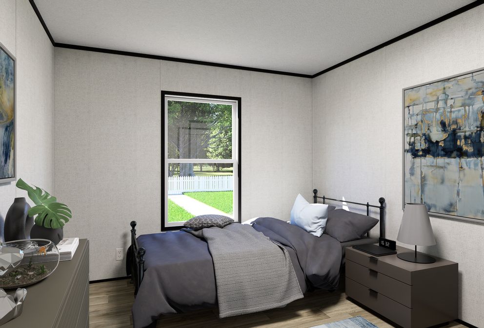 The ECLIPSE Guest Bedroom. This Manufactured Mobile Home features 4 bedrooms and 2 baths.