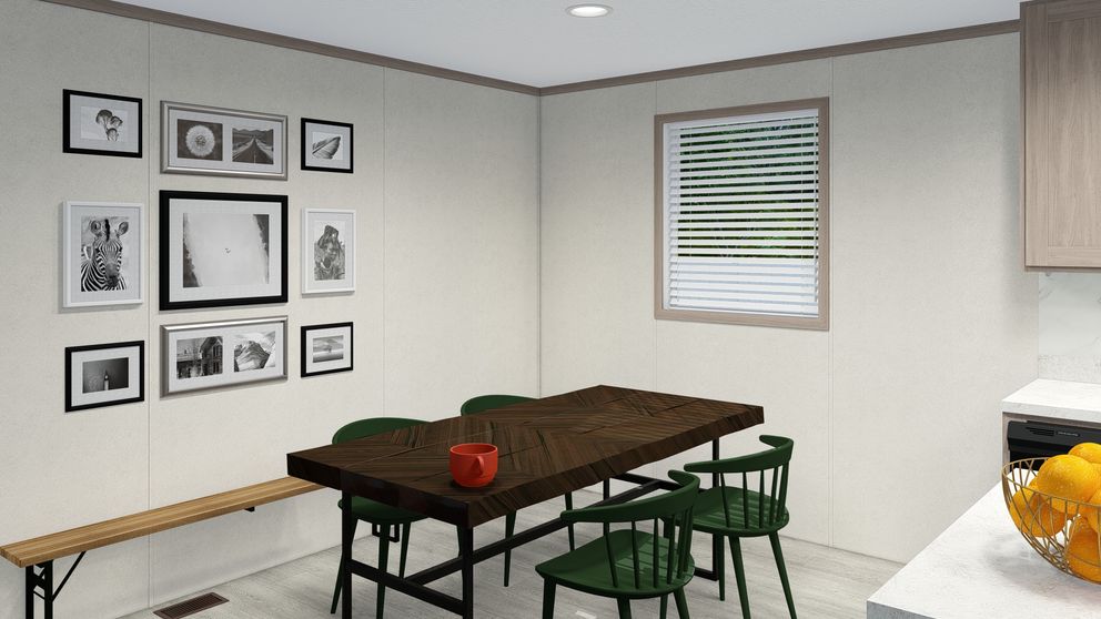 The 6028-E788 THE PULSE Dining Room. This Manufactured Mobile Home features 4 bedrooms and 2 baths.