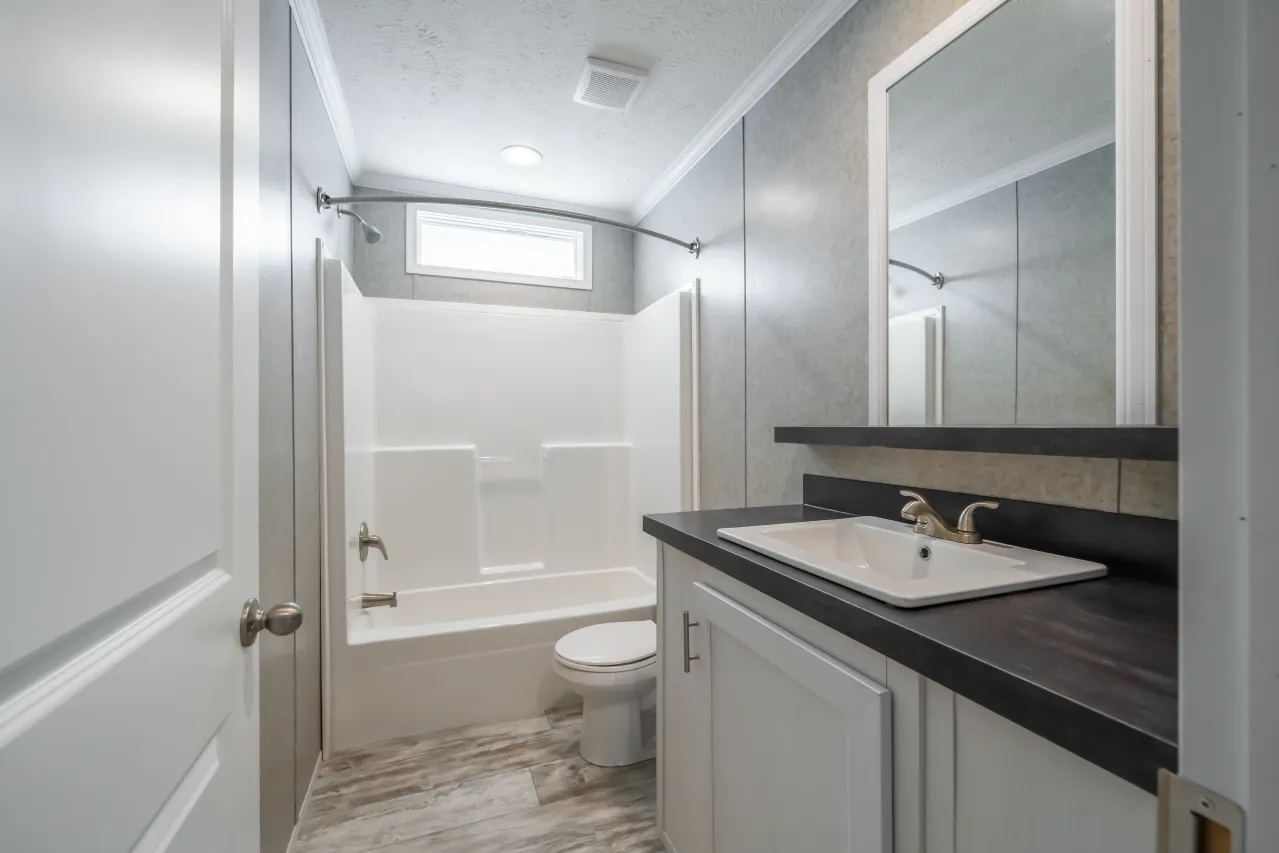 The NUMBER ONE Exterior. This Manufactured Mobile Home features 3 bedrooms and 2 baths.