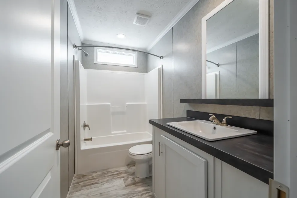 The NUMBER ONE Exterior. This Manufactured Mobile Home features 3 bedrooms and 2 baths.