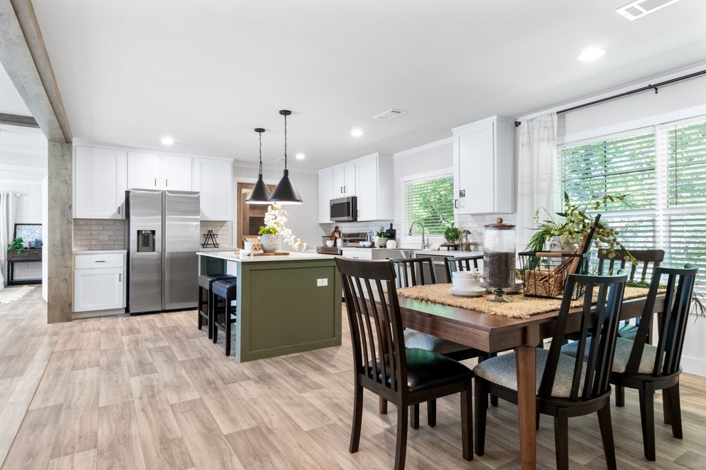 The FARM 4 FLEX ELITE Dining Room. This Manufactured Mobile Home features 4 bedrooms and 3 baths.