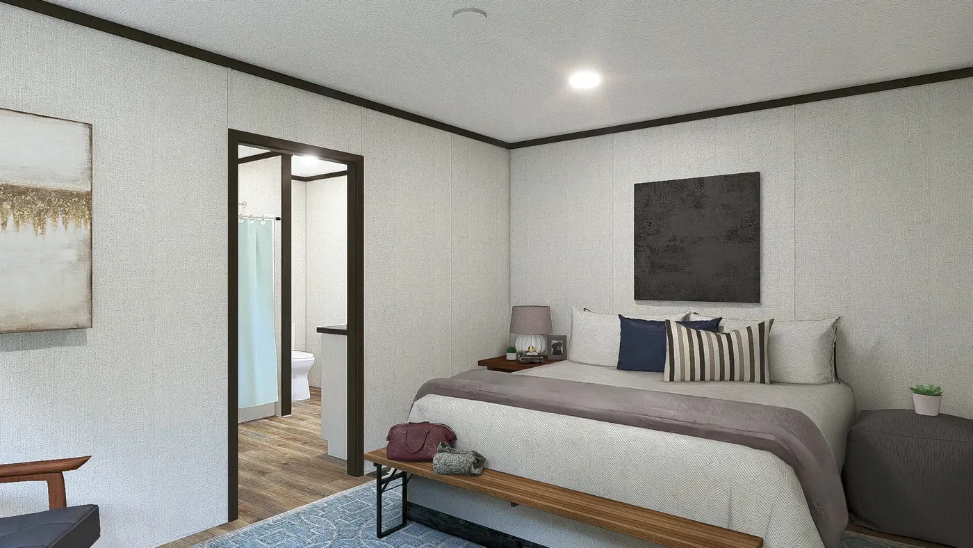 The DYNAMIC Primary Bedroom. This Manufactured Mobile Home features 3 bedrooms and 2 baths.