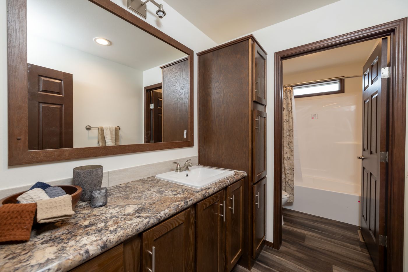 The LEGACY 327 Guest Bathroom. This Manufactured Mobile Home features 3 bedrooms and 2 baths.