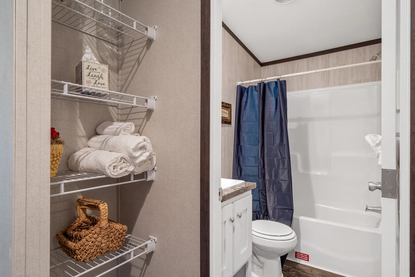 The GARNET Guest Bathroom. This Manufactured Mobile Home features 3 bedrooms and 2 baths.