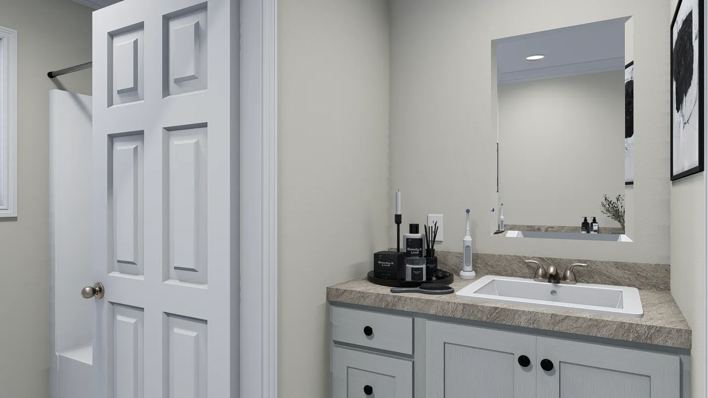 The 5425 "RIDGE" 7628 Guest Bathroom. This Manufactured Mobile Home features 4 bedrooms and 2 baths.