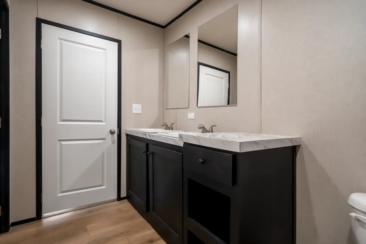The PLATINUM ANNIVERSARY Exterior. This Manufactured Mobile Home features 3 bedrooms and 2 baths.