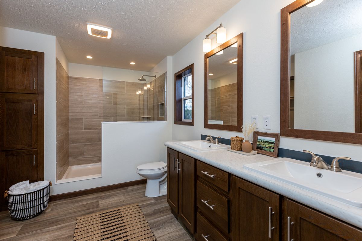 The LEGEND 86 Primary Bathroom. This Manufactured Mobile Home features 3 bedrooms and 2 baths.