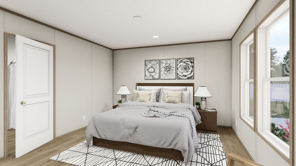 The HAVEN Primary Bedroom. This Manufactured Mobile Home features 3 bedrooms and 2 baths.