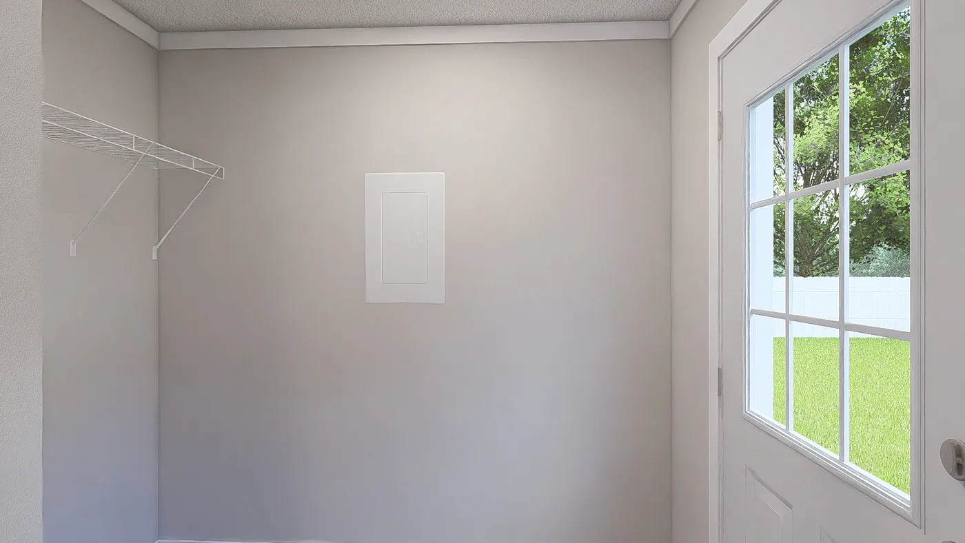 The MOVE ON UP Utility Room. This Manufactured Mobile Home features 3 bedrooms and 2 baths.