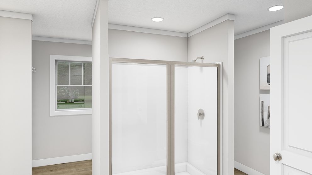 The SHOUT Primary Bathroom. This Manufactured Mobile Home features 3 bedrooms and 2 baths.