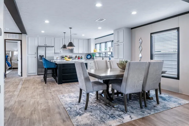 The HERCULES Dining Area. This Manufactured Mobile Home features 4 bedrooms and 2 baths.