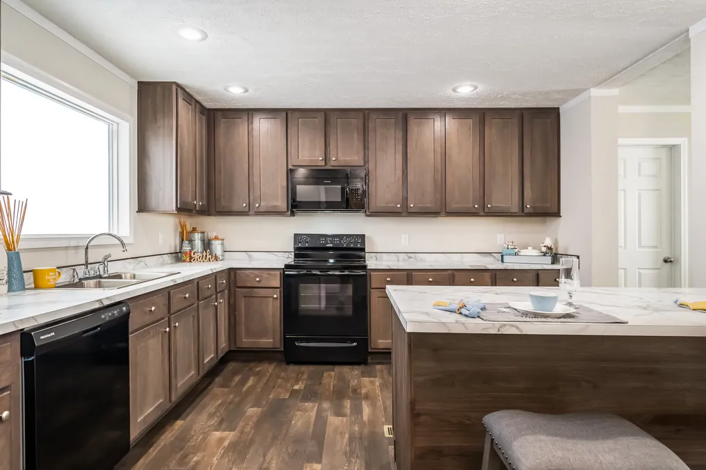 The MAVERICK 56A Kitchen. This Manufactured Mobile Home features 3 bedrooms and 2 baths.
