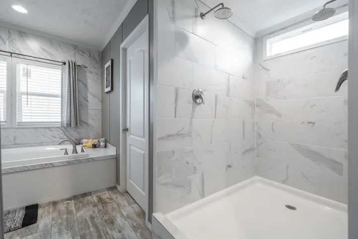 The CASCADE Primary Bathroom. This Manufactured Mobile Home features 4 bedrooms and 2 baths.