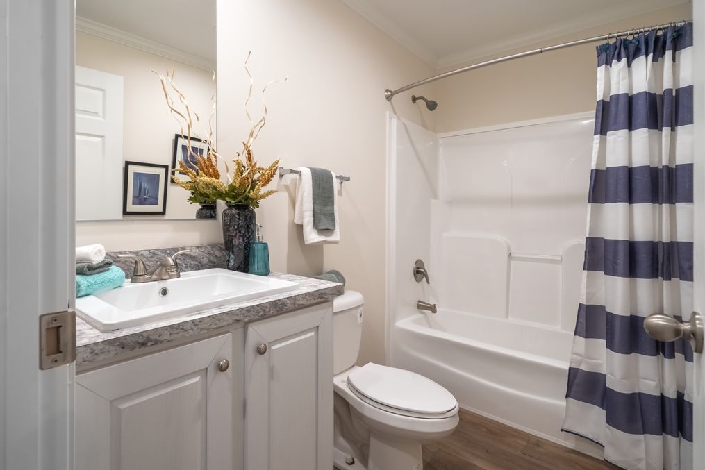 The 4210 "CAROLINA" 5628 Guest Bathroom. This Manufactured Mobile Home features 3 bedrooms and 2 baths.