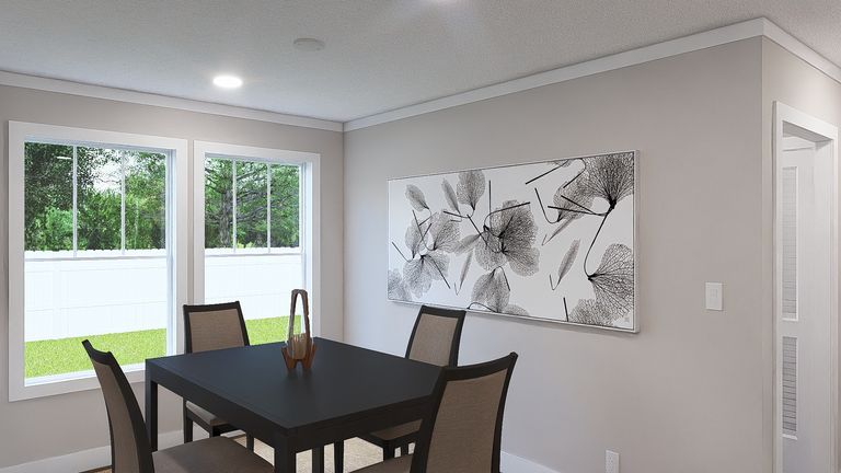 The LIMELIGHT Dining Area. This Manufactured Mobile Home features 3 bedrooms and 2 baths.