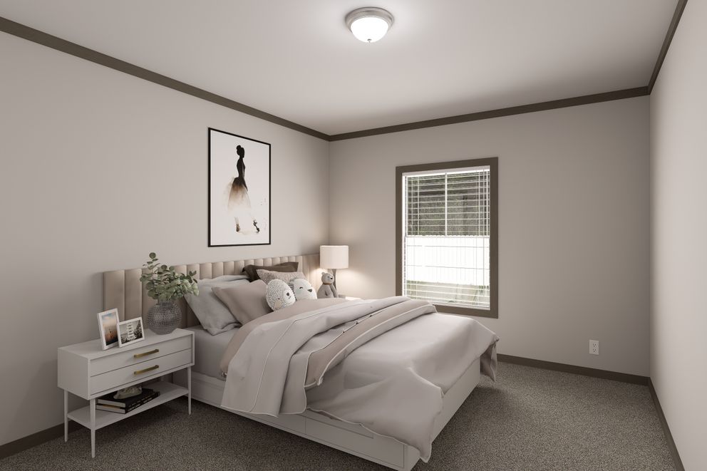 The EASY LIVIN' Bedroom. This Manufactured Mobile Home features 3 bedrooms and 2 baths.