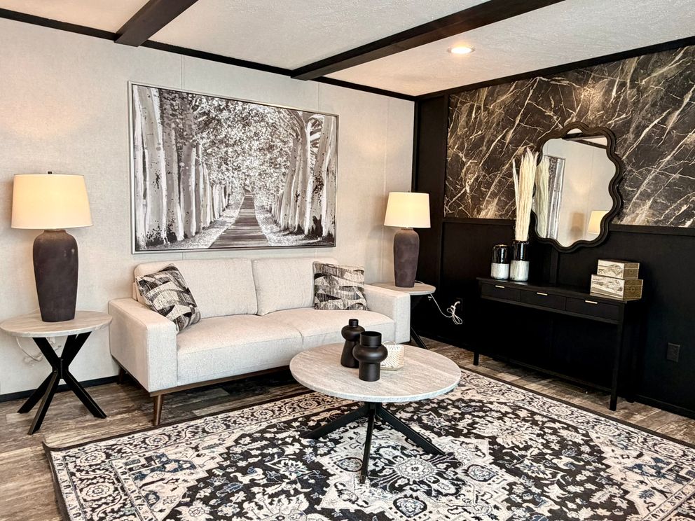 The PEARL Living Room. This Manufactured Mobile Home features 3 bedrooms and 2 baths.