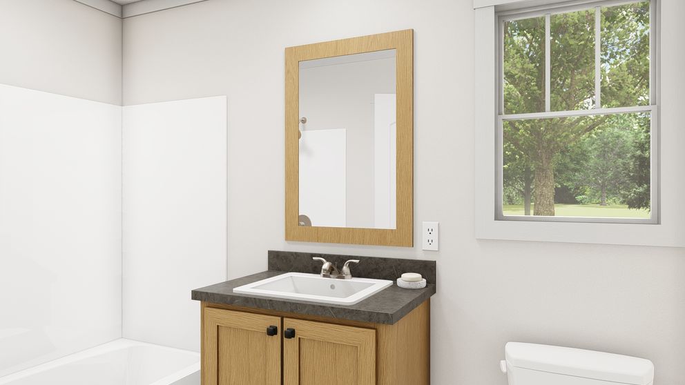 The RESPECT Guest Bathroom. This Manufactured Mobile Home features 2 bedrooms and 2 baths.