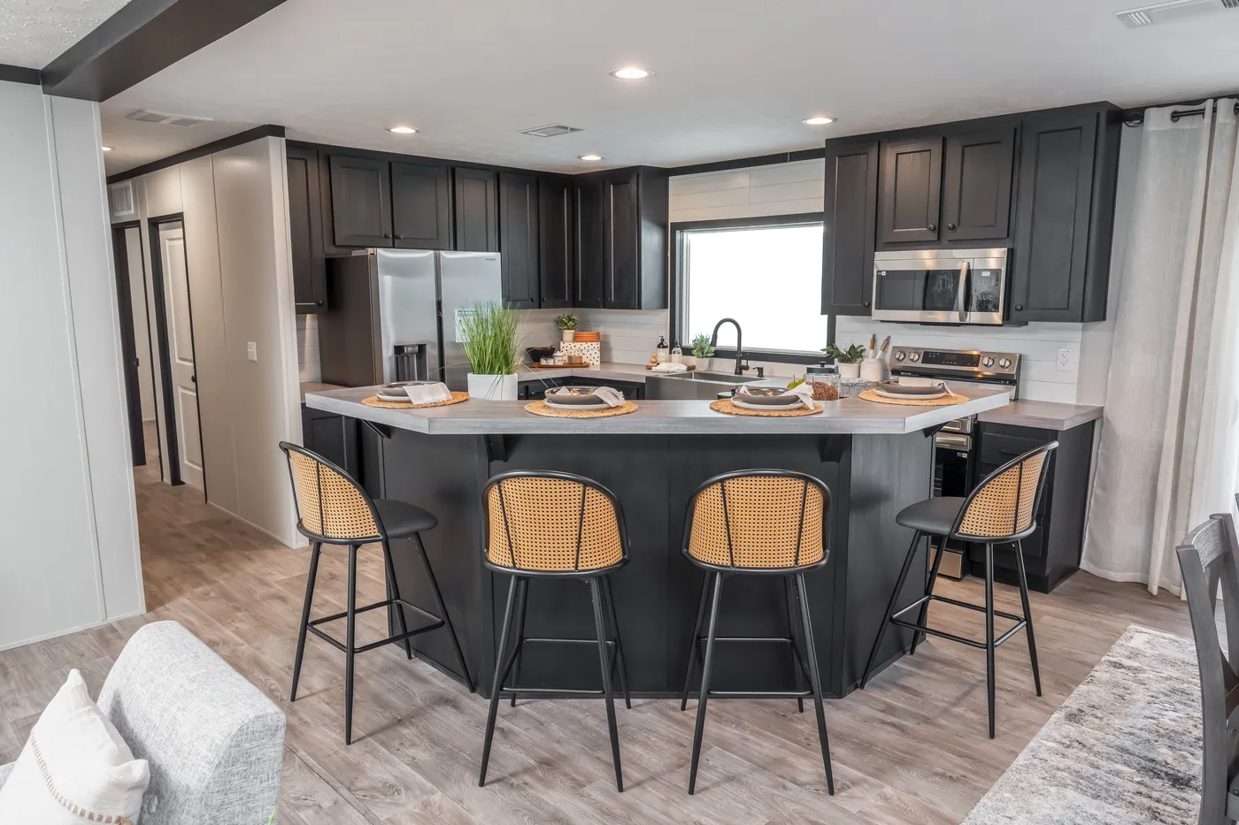 The CRAZY EIGHTS Kitchen. This Manufactured Mobile Home features 4 bedrooms and 2 baths.