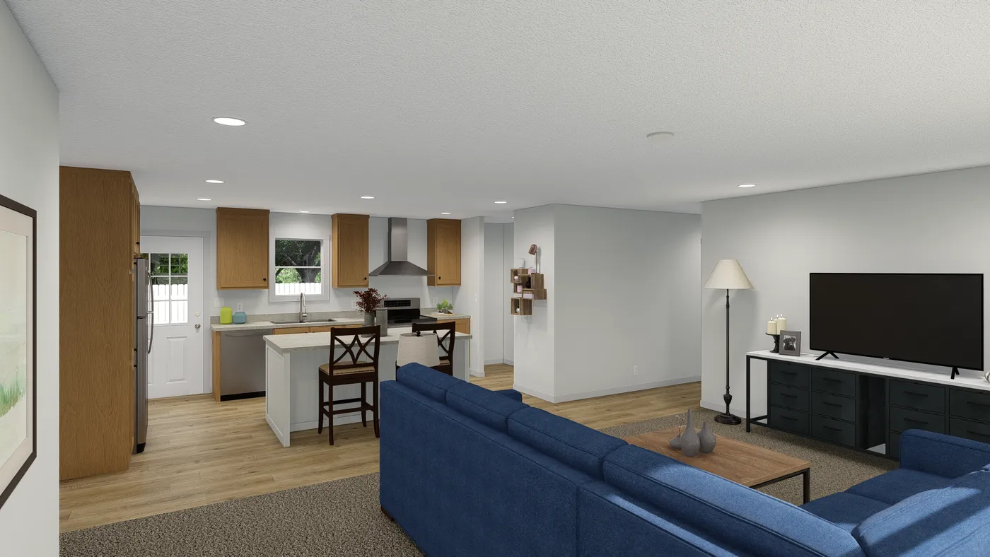 The ROCKET MAN Living Room. This Manufactured Mobile Home features 3 bedrooms and 2 baths.