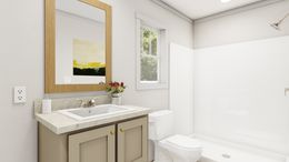 The WALK THE LINE Primary Bathroom. This Manufactured Mobile Home features 3 bedrooms and 2 baths.