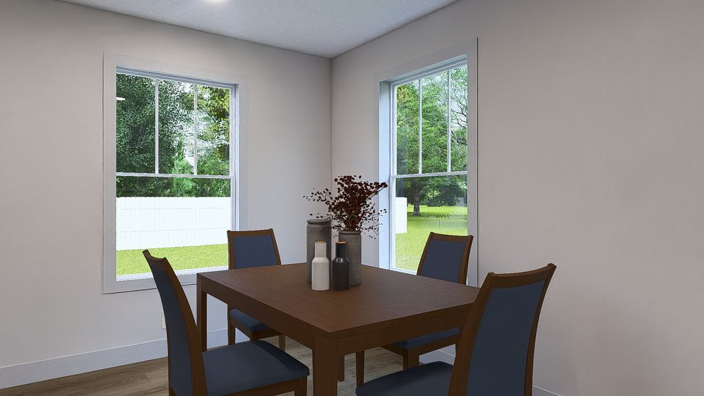 The RISING SUN Dining Room. This Manufactured Mobile Home features 2 bedrooms and 2 baths.