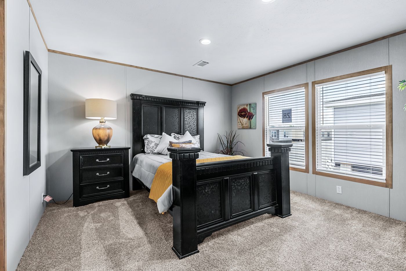 The ANATOLIA Primary Bedroom. This Manufactured Mobile Home features 3 bedrooms and 2 baths.