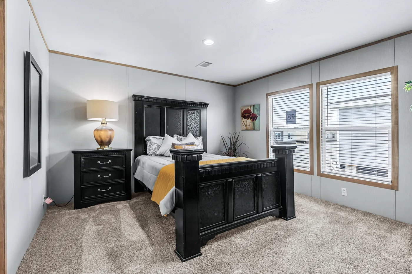 The ANATOLIA Primary Bedroom. This Manufactured Mobile Home features 3 bedrooms and 2 baths.