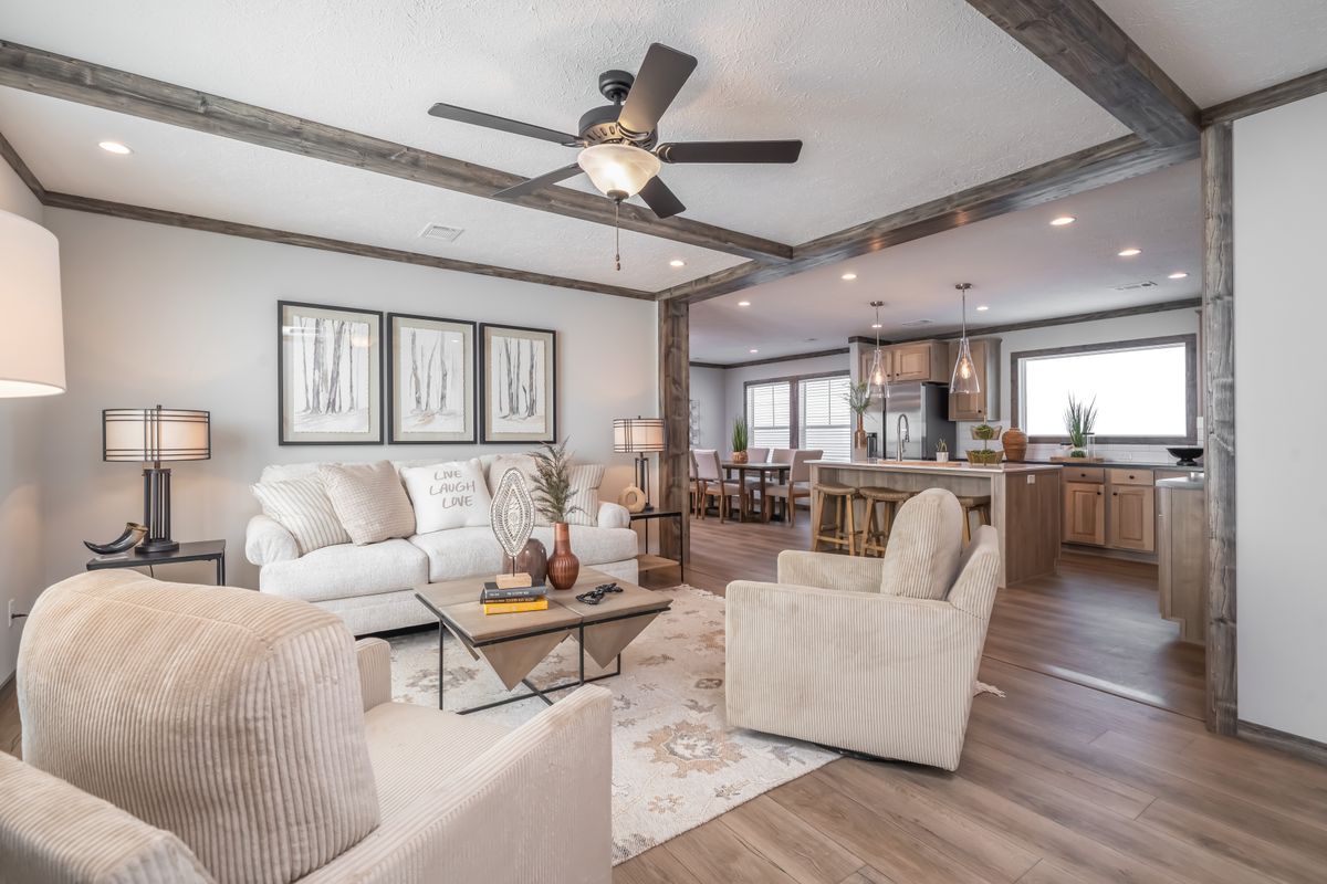 The THE JACKSON Living Room. This Manufactured Mobile Home features 4 bedrooms and 2 baths.