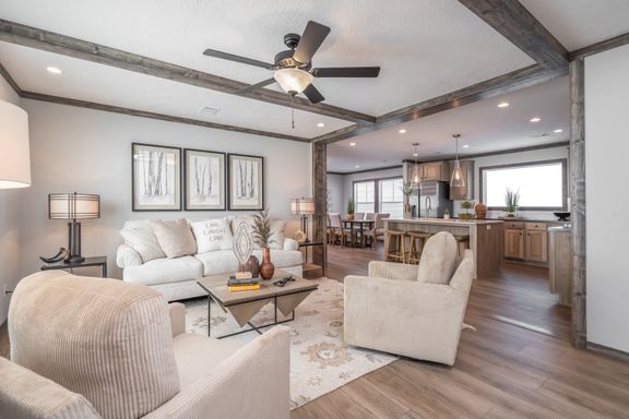 The THE JACKSON Living Room. This Manufactured Mobile Home features 4 bedrooms and 2 baths.