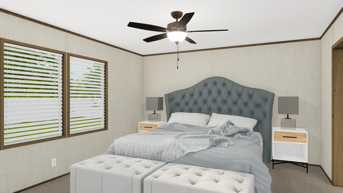 The GRAND LIVING 64 Primary Bedroom. This Manufactured Mobile Home features 3 bedrooms and 2 baths.
