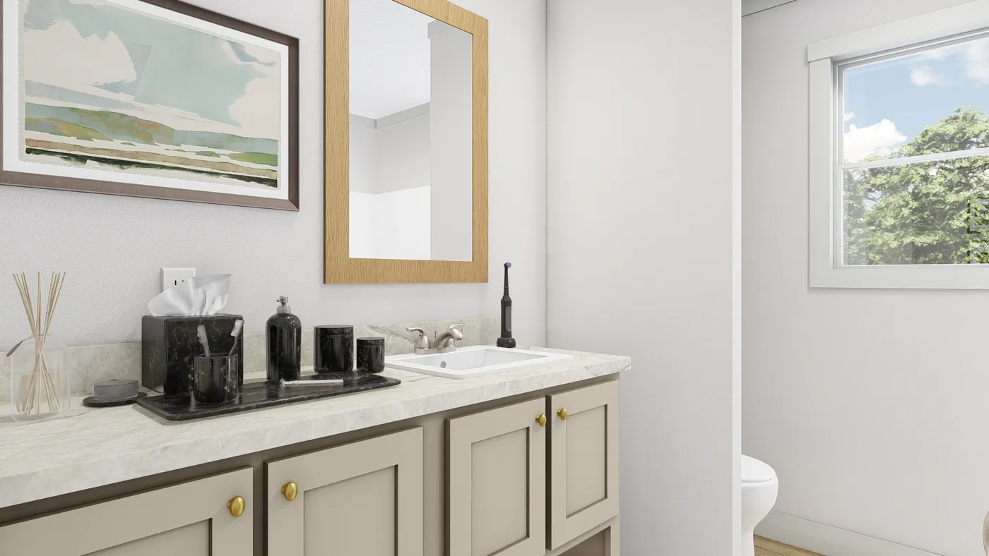 The HEY JUDE Guest Bathroom. This Manufactured Mobile Home features 5 bedrooms and 2 baths.