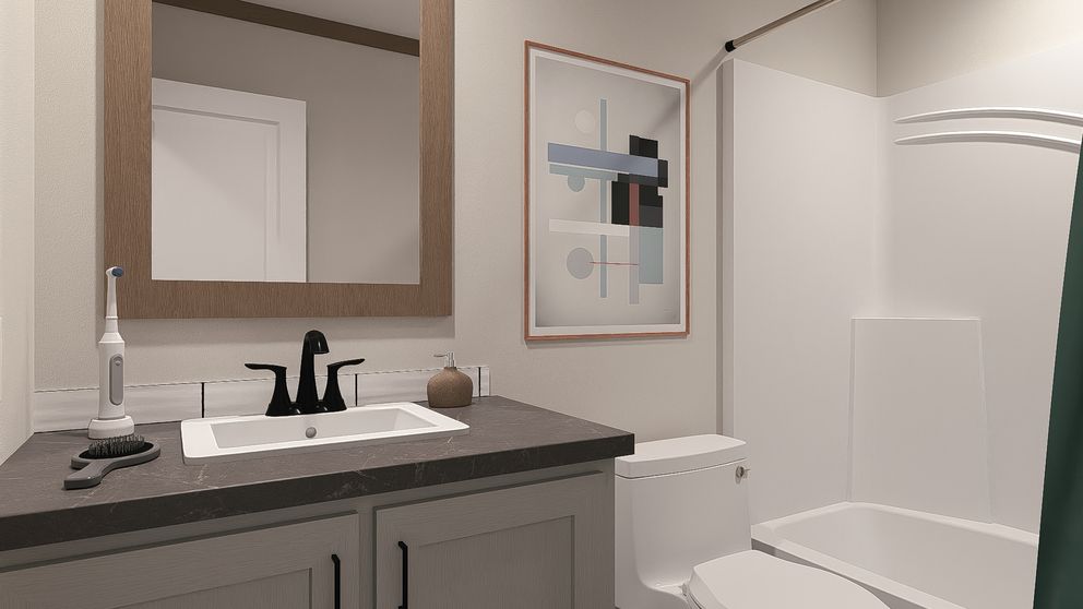 The EVERETT Guest Bathroom. This Manufactured Mobile Home features 4 bedrooms and 3 baths.