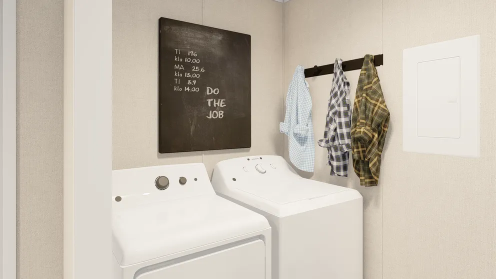 The GRAND LIVING 76B Utility Room. This Manufactured Mobile Home features 3 bedrooms and 2 baths.