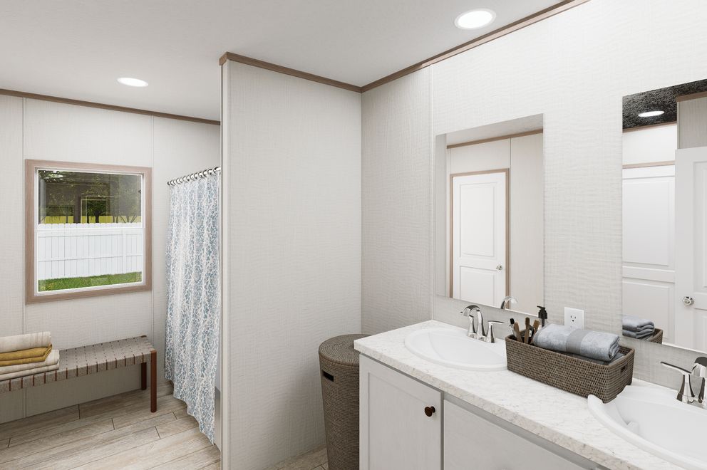 The ULTRA FLEX 76 Primary Bathroom. This Manufactured Mobile Home features 4 bedrooms and 2 baths.