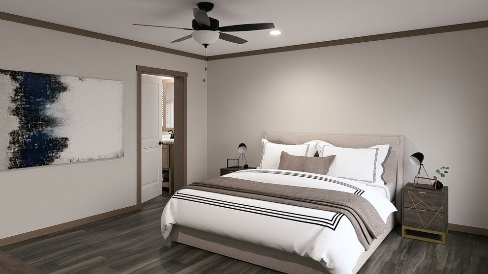 The LIZZIE ELITE Primary Bedroom. This Manufactured Mobile Home features 3 bedrooms and 2 baths.
