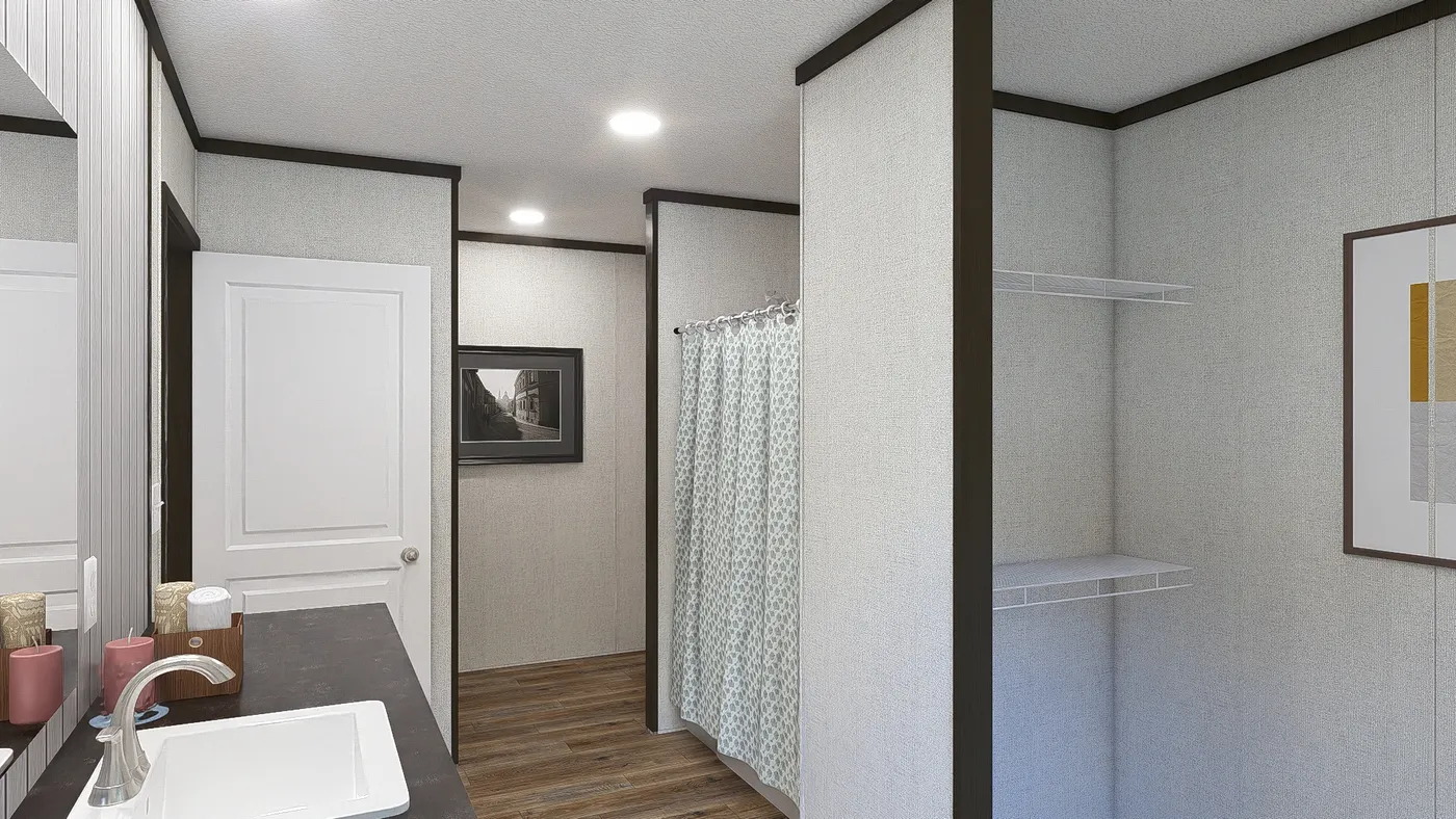 The SENSATION Primary Bathroom. This Manufactured Mobile Home features 3 bedrooms and 2 baths.