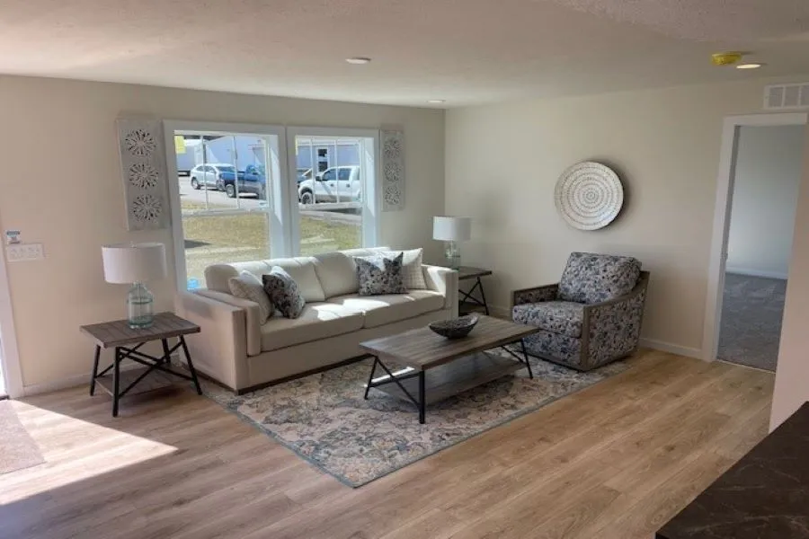 The ELM ST/5628-MS018-1 SECT Living Room. This Manufactured Mobile Home features 3 bedrooms and 2 baths.