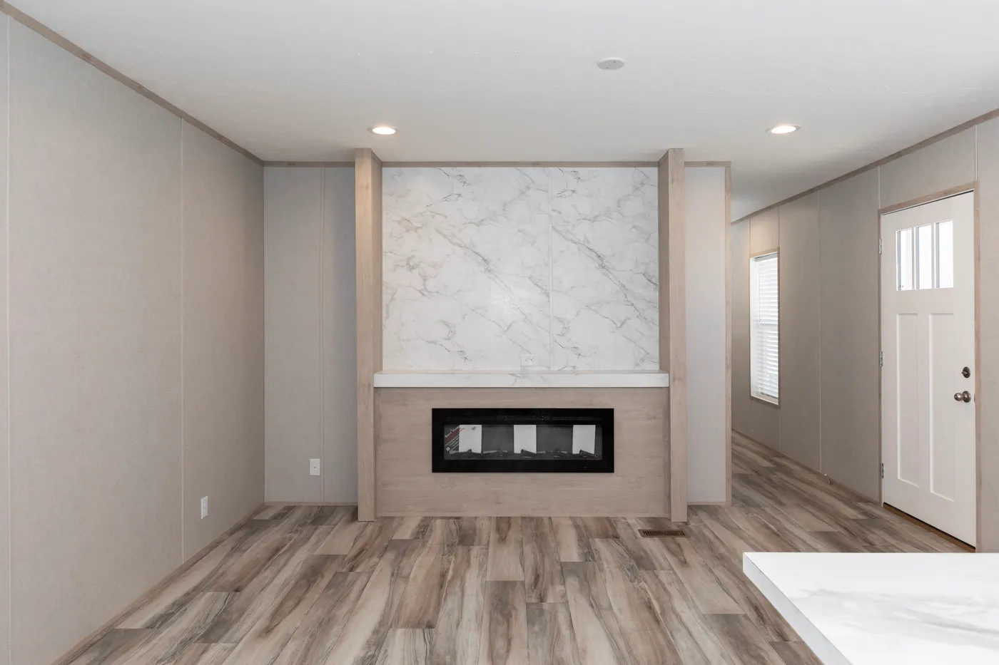 The THE THUNDERHEAD Living Room. This Manufactured Mobile Home features 3 bedrooms and 2 baths.