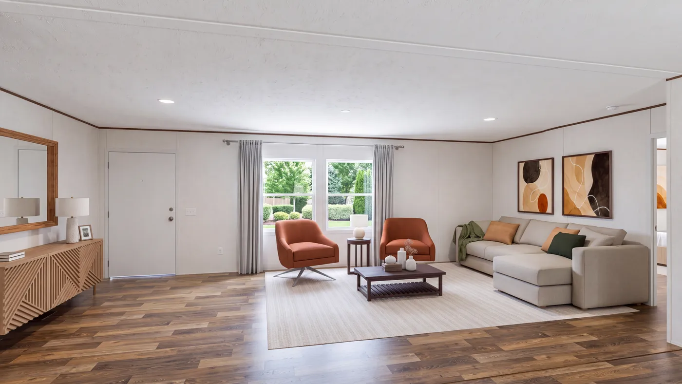 The SPRUCE Living Room. This Manufactured Mobile Home features 3 bedrooms and 2 baths.