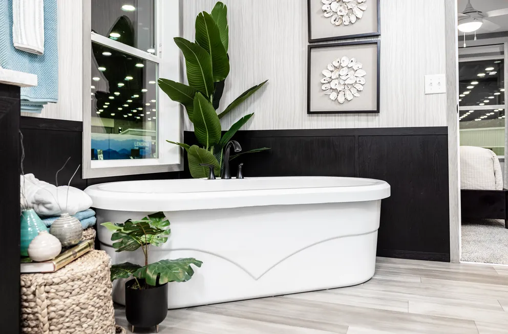 The 6428-E792 THE PULSE Primary Bathroom. This Manufactured Mobile Home features 3 bedrooms and 2.5 baths.