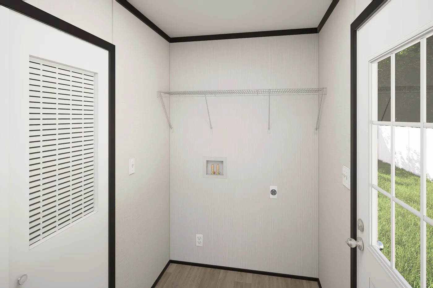The PLATINUM ANNIVERSARY Utility Room. This Manufactured Mobile Home features 3 bedrooms and 2 baths.