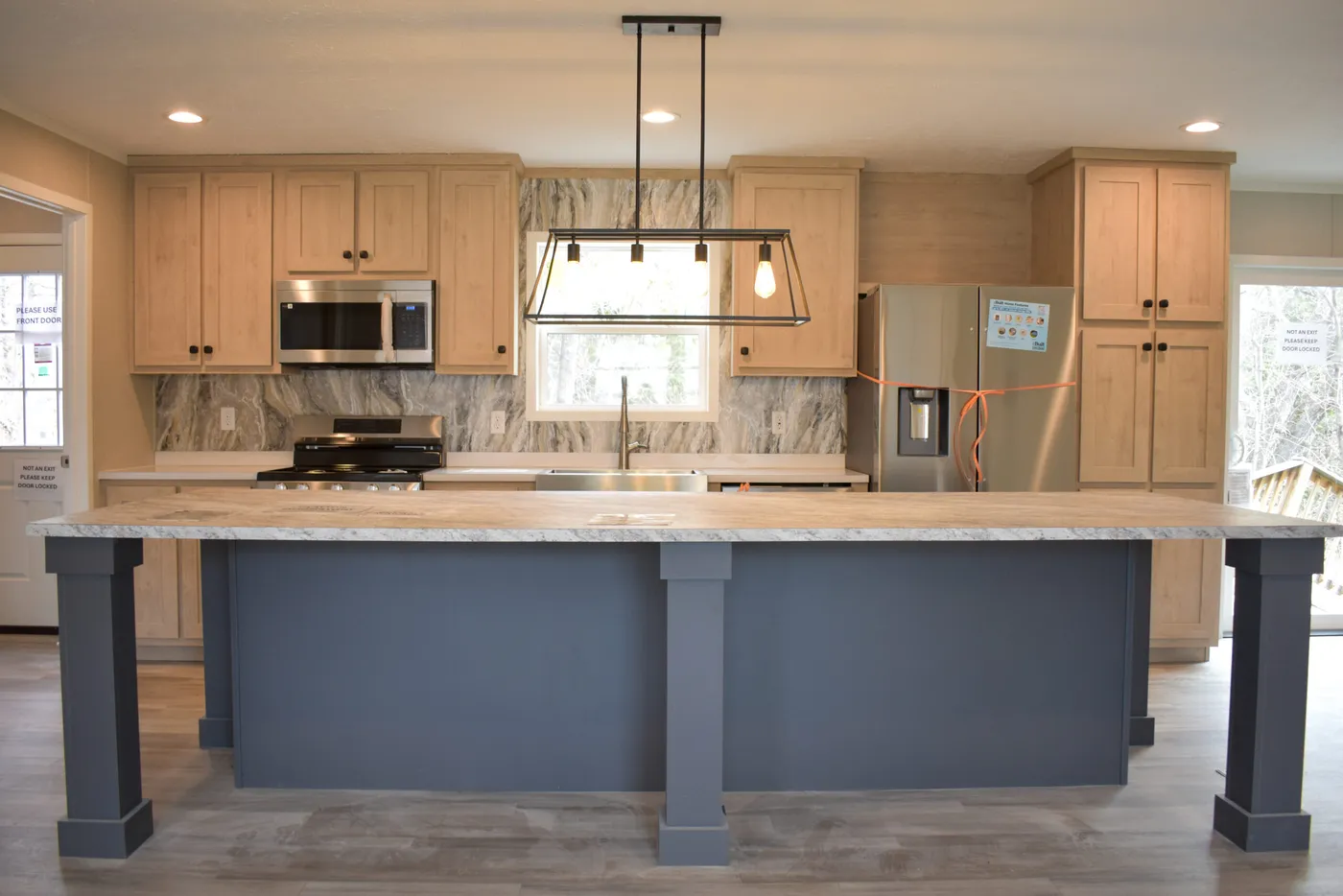 The MOONSTONE 60 Kitchen. This Manufactured Mobile Home features 3 bedrooms and 2 baths.