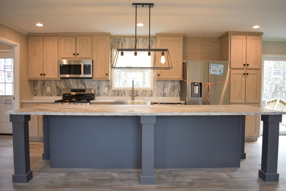 The MOONSTONE 60 Kitchen. This Manufactured Mobile Home features 3 bedrooms and 2 baths.
